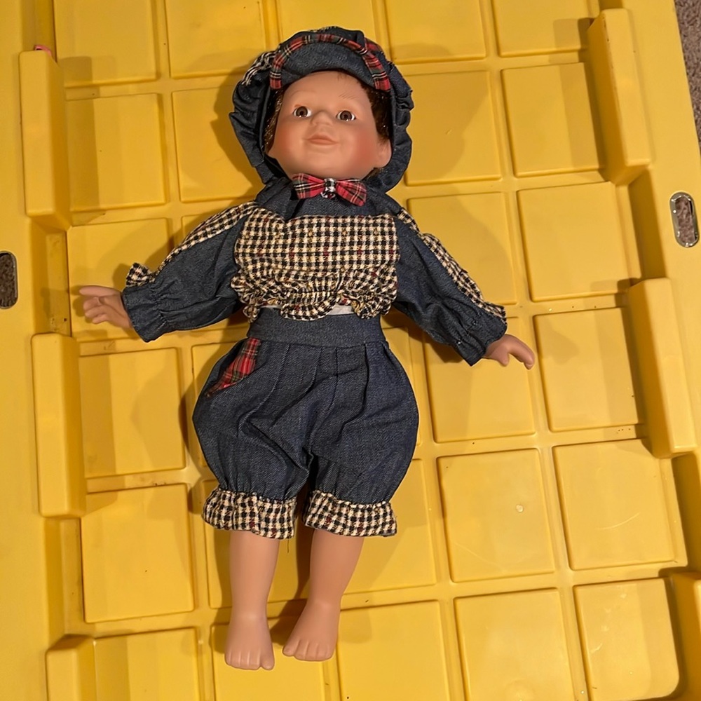 Vintage Porcelain Boy Doll 14” with porcelain face, hands, and legs.